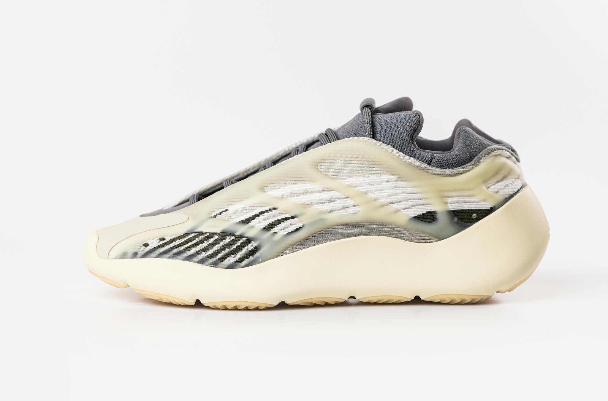 Stylish Yeezy 700 V3 sneakers displayed in clean product photography with a white background.